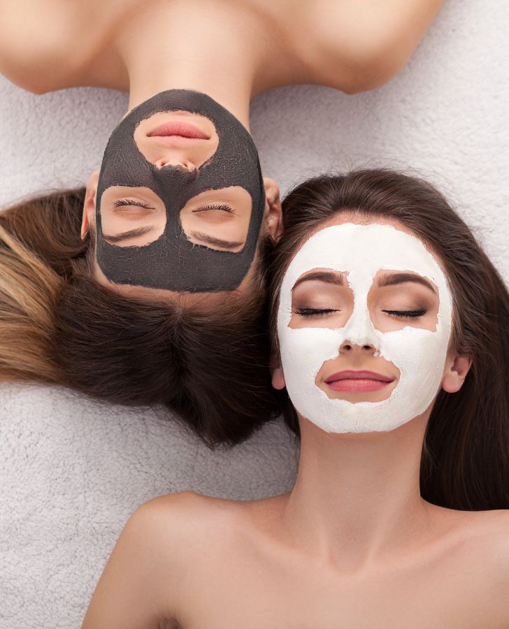 Two Women Receiving Facial Treatments